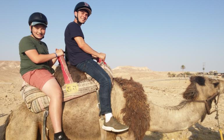 Jewish Teens riding Camels in Israel.