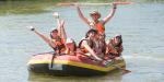 Teens rafting down the Jordan River
